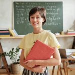 Teacher teaching at school