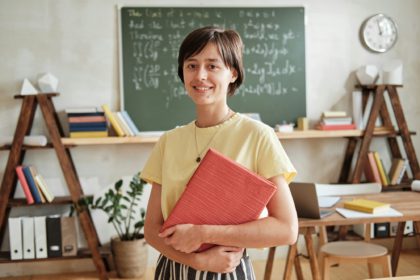 Teacher teaching at school